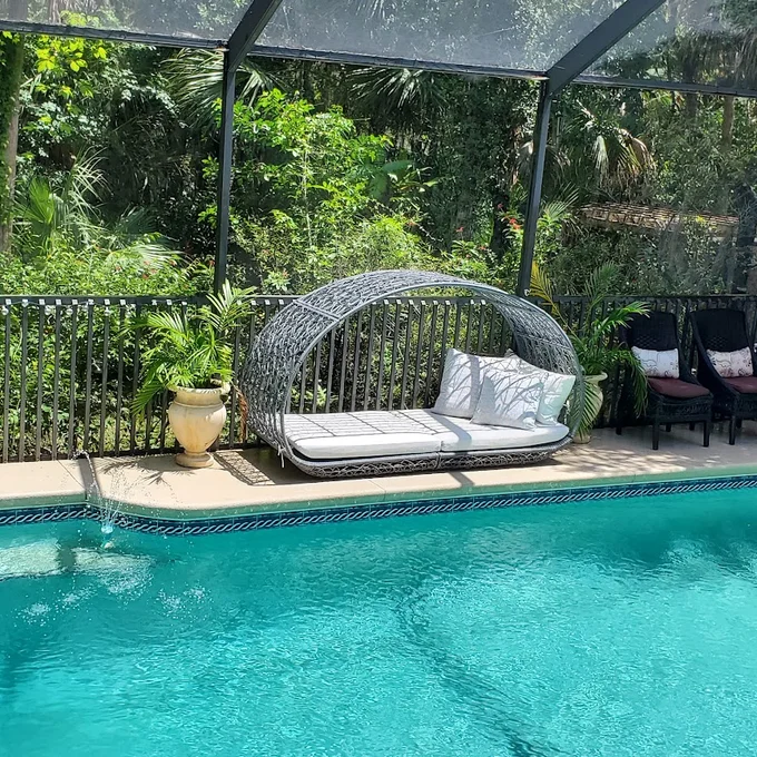 Outdoor Wicker Canopy Daybed with Water-Resistant Cushion